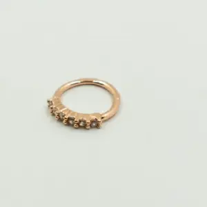PIERCING ORO ROSA CIRCULAR CRISTALES