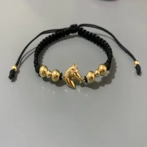 Manilla caballo oro laminado