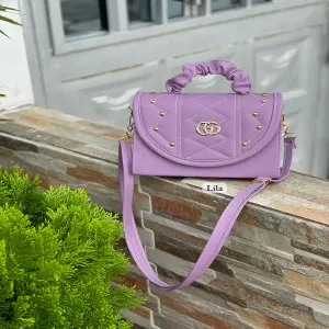 Bolso o cartera doble función