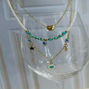 collar triple en oro golfi