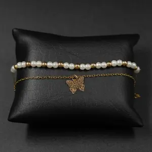 TOBILLERA MARIPOSA BLANCA PERLA ACERO