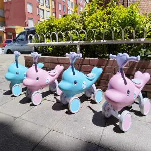 Andador montable musical delfin