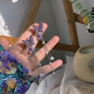Joyería de mariposa morada