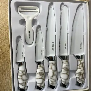 SET DE CUCHILLO CAJA PLANA