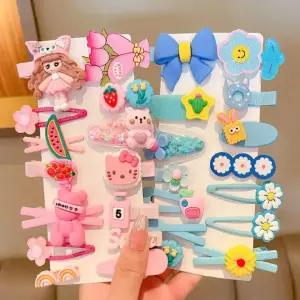 hebillas para niñas en forma de figurita