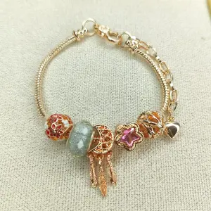 Pulsera tipo pandora oro rosa