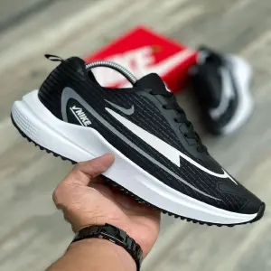 Nike AX caballero ton