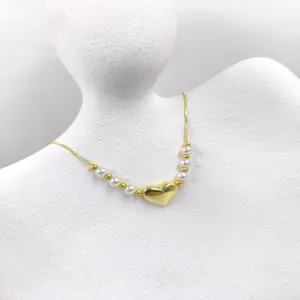 collar rodio y perla de corazon