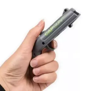 Destapador de pistola lanza tapas