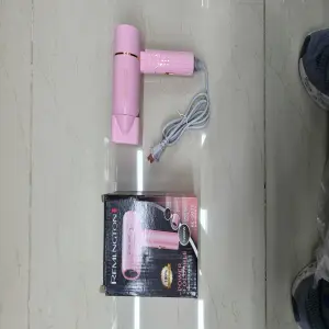 Secador pelo portátil
