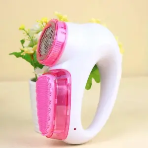 Quita motas con cepillo recargable