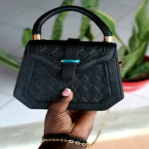 Bolso baúl elegante