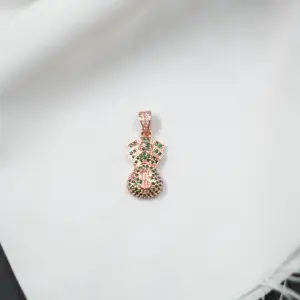 DIJE BOLSA DINERO ROSADO PIEDRAS VERDES