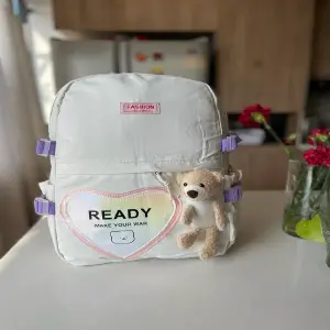 Morral con osito de peluche