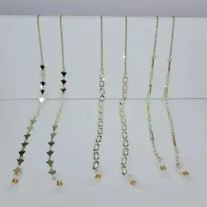 TIRAS DE GAFAS FIGURAS DORADAS
