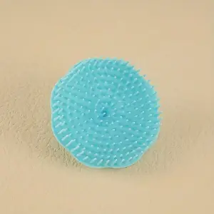 CEPILLO EN FORMA DE FLOR PARA SHAMPOO