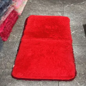 Alfombra pie de cama