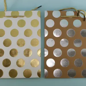 Bolsa de regalo  pequeña puntos dorado
