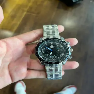 RELOJ TS 40