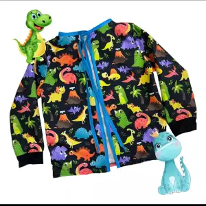 Delantal escolar antifluido dinosaurio