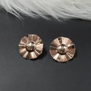 ARETE RODIO CIRCULAR TIPO FLOR ROSADO