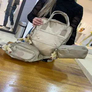 MORRAL+RIÑONERA+COSMETIQUERA DR-21400