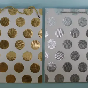 Bolsa de regalo mediano puntos dorados