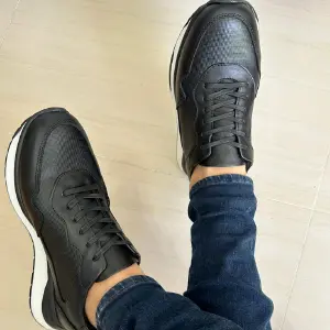Sneakers en Cuero