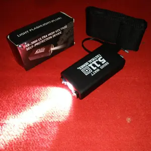TASER 511 TABANO CON LINTERNA