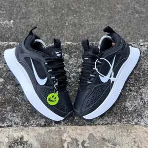 NIKE BAILLEILI NEGRO DAMA & HOMBRE