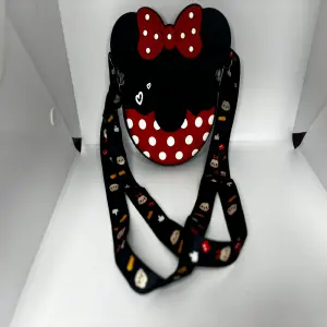 BOLSO EN SILICONA MINNIE NEGRO PEQ