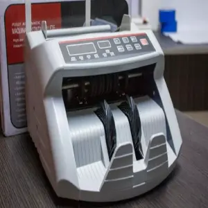 Maquina contadora de billetes