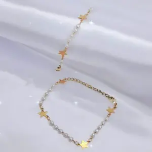 MANILLA PERLAS Y ESTRELLAS DORADAS