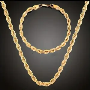 Combo cadena + pulsera tejido laso 18k