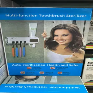Dispensador de crema dental con porta ce