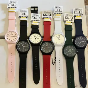 Reloj Q&Q Unisex con calendario silicona