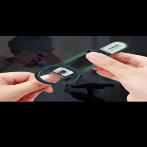Corta uñas con lupa