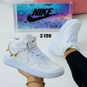 BOTA NIKE DE DAMA