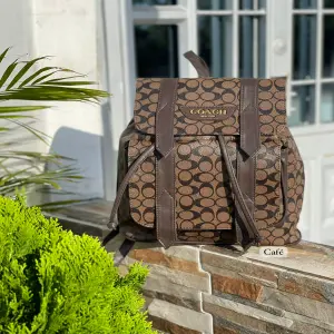 Bolso morral COACH tipo tula