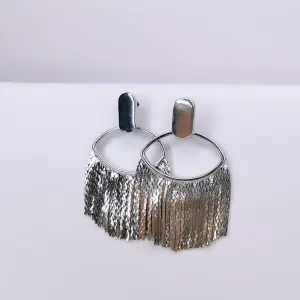 ARETA PLATEADA FLECOS