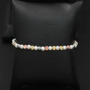 COMBO: PULSERA-TOPOS