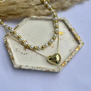 collar en rodio perlas y dije corazon