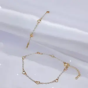 MANILLAS CORAZONES DORADOS