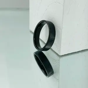 ANILLO PADRE NUESTRO NEGRO PAVONADO