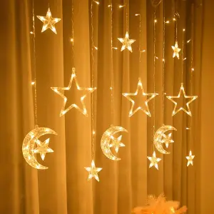 Luz lluvia con figuras luna, estrella