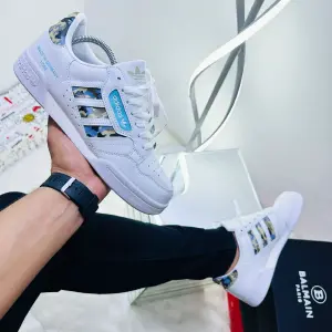 ADIDAS CONTINENTAL BLANCO VERDE - HOMBRE