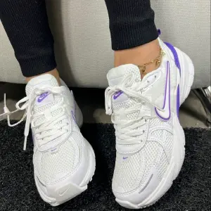 LINDO NIKE TRACTOR DAMA