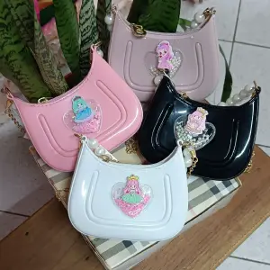 BOLSO MANOS LIBRE INFANTIL MUÑECA