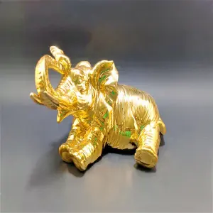 ELEFANTE DECORATIVO DORADO