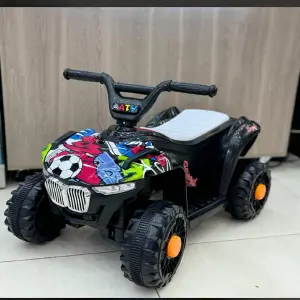 Triciclo electrico de 4 ruedas para niño